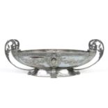 A WMF silver plated centrepiece of ovoid form. With scrolling handles, key fret border and