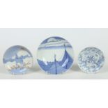 Three Japanese early 20th century blue and white dishes. One of Nebeshima style depicting fishing