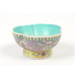 A Chinese Qing dynasty trefoil bowl. With turquoise ground interior, Having pink ground exterior