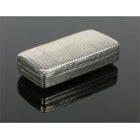 A Georgian silver snuff box with reeded moulding and gilt interior. 49 grams, 6.5cm. Condition