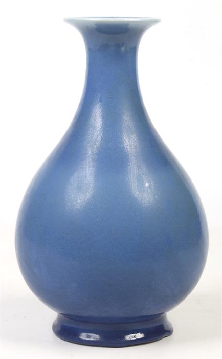 A Chinese 19th century pear formed bottle vase. Decorated in a thick blue glaze. Six character