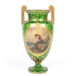 A 19th century emerald green Bohemian glass vase of Empire shape. Gilded with a ground of trailing