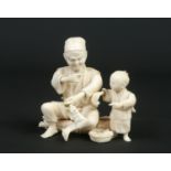 A Japanese early 20th century carved ivory okimono. Formed as a man seated on a bundle of sticks