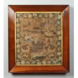 An early 19th century large woolwork sampler in parcel gilt rosewood frame. Inscribed Anne