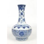 A 19th Chinese blue and white bottle shaped vase. Painted in underglaze blue with precious objects