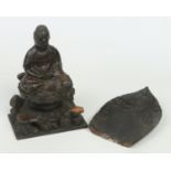 A 19th century Sino-Tibetan carved polychrome wood sculpture of Buddha seated in meditation, 30cm.