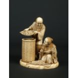 A very fine Japanese Meiji period carved ivory okimono. Formed as a farmer and his companion