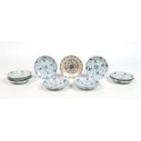 Ten Chinese Tek Sing cargo blue and white dishes. Painted in underglaze blue, nine depict single