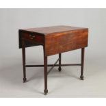 A Georgian mahogany Pembroke table. With single drawer, raised on reeded square supports with X-