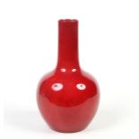 A large Royal Doulton flambe glazed bottle vase. Printed mark, 37cm. Condition report intended as