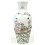 A Chinese Guangxu (1875-1908) baluster shaped vase. Painted in coloured enamels with two maidens