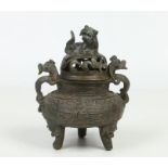 A Japanese Edo period bronze koro and cover. Surmounted with a recumbent dog of fo and with a pair