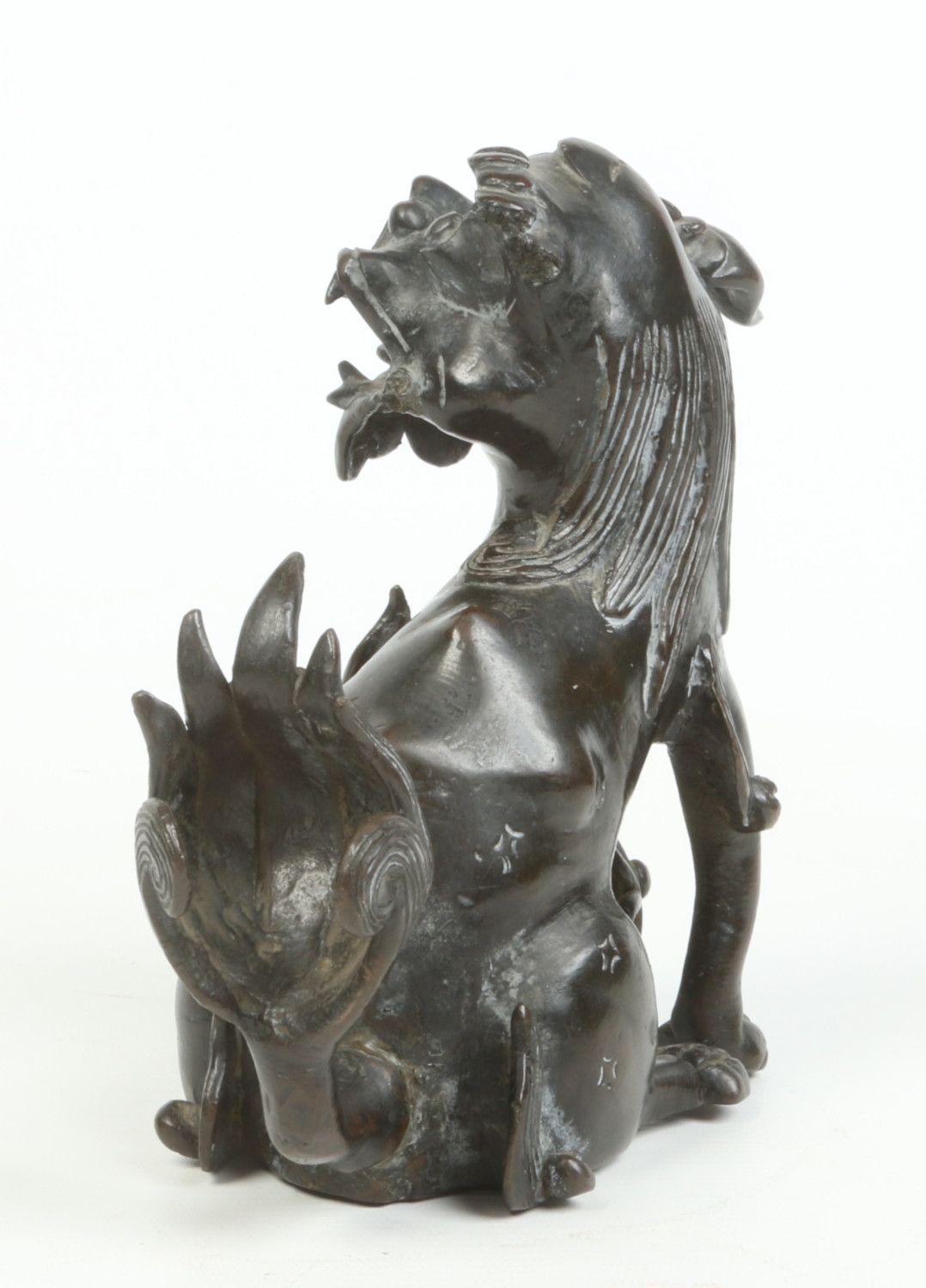 An antique Chinese patinated bronze sculpture of a lion dog guarding a brocade bowl, possibly - Image 4 of 7