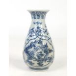 A 19th century Chinese pear shaped blue and white vase. Moulded and painted in underglaze blue