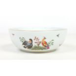 An early 20th century Meissen bowl. Decorated in coloured enamels with two vignettes of coloured