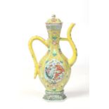 A 19th century Chinese hexagonal baluster wine ewer and cover with scrolling handle and spout.