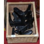 A box of cast iron hobbing feet.