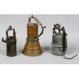 Three vintage miners lamps one named The Premier Lamp made by Crestelia & Engineering Co. Ltd