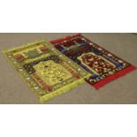 Two Turkish silk prayer mats decorated with mecca and flowers, length 120cm width 65cm.