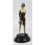 After Bruno Zach, an Art Deco style sculpture of a semi clad maiden with a riding crop, raised on