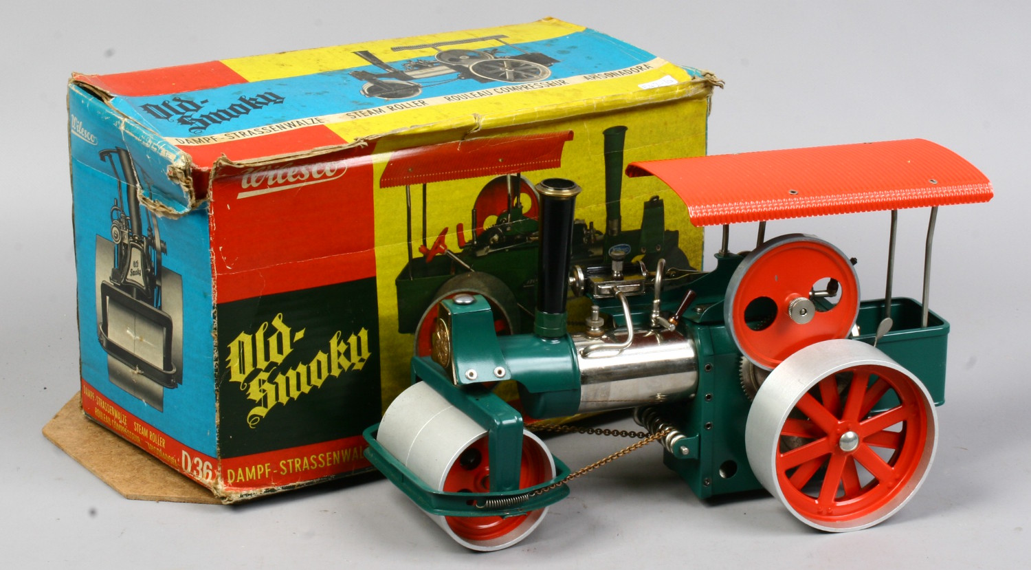 A boxed Wilesco 'Old Smoky' live steam traction engine steam roller with original accessories.