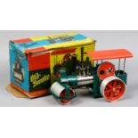A boxed Wilesco 'Old Smoky' live steam traction engine steam roller with original accessories.
