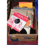 A box of 78rpm records various artist including Elvis Presley, Little Ricard, The Crickets etc.