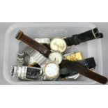 A box of manual quartz and digital watches some in need of repair.