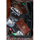 A box of photographic equipment including Kodak, Polaroid, Fujifilm, Olympus etc.