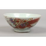 A 17th / 18th century oriental provincial bowl, possibly Korean or Chinese painted in coloured