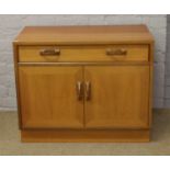 A teak G plan cupboard base with single drawer.