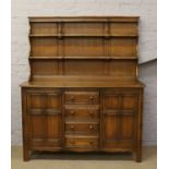 An Ercol chestnut Welsh dresser.