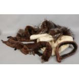 A collection of furs to include stoles, coat collars, fur wraps etc.