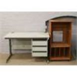 A cantilever three drawer office desk and a teak music cabinet.