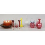 A collection of coloured glass to include cranberry and carnival etc.