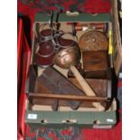 A box of wooden items to include carved Buddha, egg timer, money box etc.