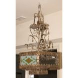 A French brass three branch hall lantern decorated with etched glass panels.