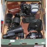 A box of photographs and binoculars to include Canon lenses, Macro lens, Genabox etc.