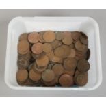A collection of British pre-decimal pennies and half pennies.