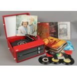 A Fidelity vinyl covered portable record player with BSR turntable, along with a collection of L.P's