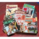 A box of vintage action and adventure comics to in