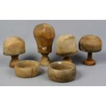 A group of millinery / hat makers wood block heads and hoops.