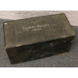 A tin travel trunk inscription Charles Brands Trust with Sally Line GB sticker.