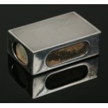 A George V silver match box holder assayed London 1933 by Harrods Limited Richard Woodman