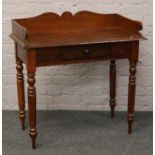 A Victorian carved and stained pine washstand.