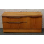 A retro teak low level sideboard.