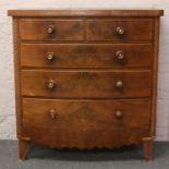 A Victorian mahogany bow front chest of drawers.