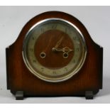 An oak cased Enfield mantle clock housing a two train movement with key and pendulum.