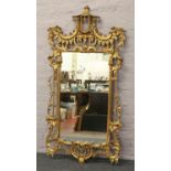 A gilt Chippendale style pier mirror, approximately 160cm x 79cm. Condition report intended as a