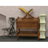 Four pieces of occasional furniture including; two tier oak trolley, painted black metal plant